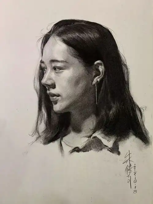 素描头像中长发侧颜女青年