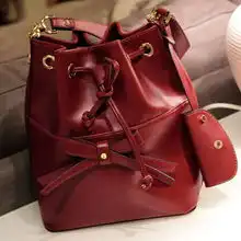 2012欧美春季复古英伦邮差包水桶女包新款斜挎单肩包